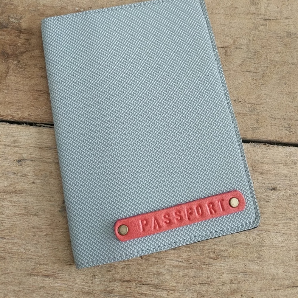 Light gray textured travel wallet, passport holder